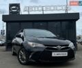 Чорний Тойота Камрі, об'ємом двигуна 2.49 л та пробігом 210 тис. км за 10990 $, фото 1 на Automoto.ua