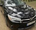 Черный Тойота Камри, объемом двигателя 2.5 л и пробегом 180 тыс. км за 13500 $, фото 1 на Automoto.ua