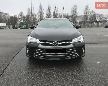 Черный Тойота Камри, объемом двигателя 2.5 л и пробегом 130 тыс. км за 15200 $, фото 1 на Automoto.ua