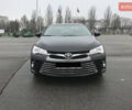 Черный Тойота Камри, объемом двигателя 2.5 л и пробегом 130 тыс. км за 15200 $, фото 1 на Automoto.ua