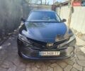Черный Тойота Камри, объемом двигателя 2.46 л и пробегом 87 тыс. км за 25500 $, фото 1 на Automoto.ua