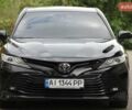 Чорний Тойота Камрі, об'ємом двигуна 2.49 л та пробігом 130 тис. км за 22990 $, фото 1 на Automoto.ua
