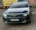 Черный Тойота Камри, объемом двигателя 2.49 л и пробегом 217 тыс. км за 18000 $, фото 1 на Automoto.ua