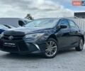 Черный Тойота Камри, объемом двигателя 2.5 л и пробегом 285 тыс. км за 11500 $, фото 1 на Automoto.ua