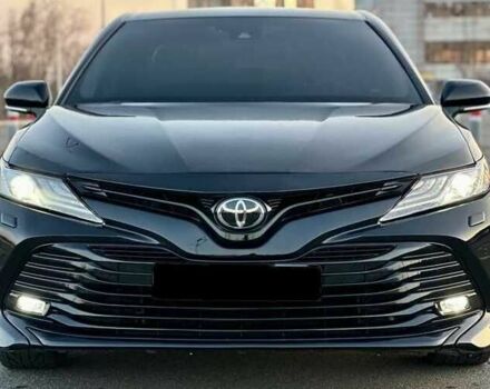 Черный Тойота Камри, объемом двигателя 2.5 л и пробегом 105 тыс. км за 16200 $, фото 1 на Automoto.ua