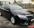 Черный Тойота Камри, объемом двигателя 2.5 л и пробегом 133 тыс. км за 18200 $, фото 1 на Automoto.ua