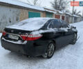 Черный Тойота Камри, объемом двигателя 2.5 л и пробегом 131 тыс. км за 8300 $, фото 1 на Automoto.ua