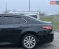 Черный Тойота Камри, объемом двигателя 2.49 л и пробегом 159 тыс. км за 14900 $, фото 4 на Automoto.ua