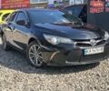 Чорний Тойота Камрі, об'ємом двигуна 2.49 л та пробігом 219 тис. км за 11900 $, фото 1 на Automoto.ua
