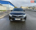 Черный Тойота Камри, объемом двигателя 2.49 л и пробегом 170 тыс. км за 17000 $, фото 1 на Automoto.ua