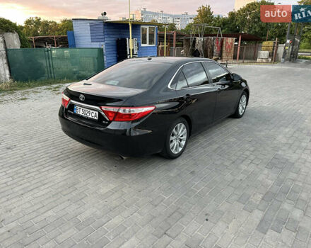 Чорний Тойота Камрі, об'ємом двигуна 2.49 л та пробігом 132 тис. км за 16000 $, фото 2 на Automoto.ua