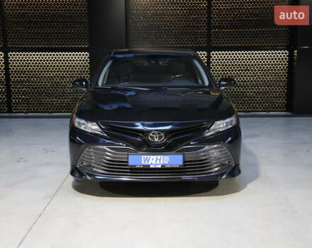 Черный Тойота Камри, объемом двигателя 2.49 л и пробегом 145 тыс. км за 16800 $, фото 1 на Automoto.ua