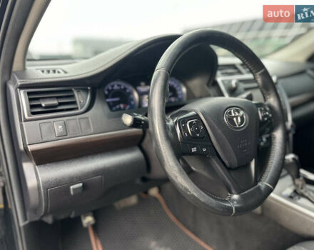 Чорний Тойота Камрі, об'ємом двигуна 2.49 л та пробігом 185 тис. км за 14500 $, фото 18 на Automoto.ua