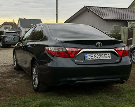 Чорний Тойота Камрі, об'ємом двигуна 2.49 л та пробігом 176 тис. км за 14500 $, фото 4 на Automoto.ua