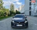 Черный Тойота Камри, объемом двигателя 2.49 л и пробегом 143 тыс. км за 19000 $, фото 1 на Automoto.ua