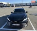 Черный Тойота Камри, объемом двигателя 2.5 л и пробегом 127 тыс. км за 22500 $, фото 1 на Automoto.ua