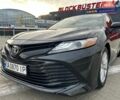 Черный Тойота Камри, объемом двигателя 2.49 л и пробегом 115 тыс. км за 18200 $, фото 1 на Automoto.ua