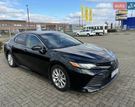 Черный Тойота Камри, объемом двигателя 2.5 л и пробегом 167 тыс. км за 18000 $, фото 5 на Automoto.ua