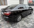Черный Тойота Камри, объемом двигателя 2.49 л и пробегом 210 тыс. км за 16950 $, фото 1 на Automoto.ua