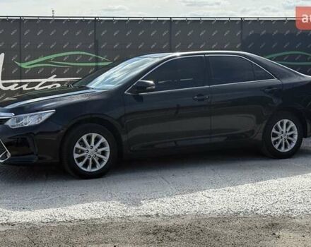 Черный Тойота Камри, объемом двигателя 2.49 л и пробегом 105 тыс. км за 17000 $, фото 1 на Automoto.ua