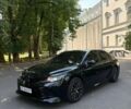 Черный Тойота Камри, объемом двигателя 2.49 л и пробегом 150 тыс. км за 18500 $, фото 1 на Automoto.ua