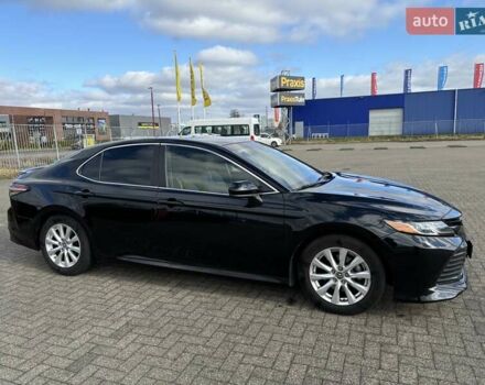 Черный Тойота Камри, объемом двигателя 2.5 л и пробегом 167 тыс. км за 18000 $, фото 6 на Automoto.ua