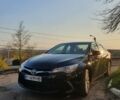 Черный Тойота Камри, объемом двигателя 2.49 л и пробегом 75 тыс. км за 16800 $, фото 1 на Automoto.ua
