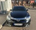 Черный Тойота Камри, объемом двигателя 2.49 л и пробегом 130 тыс. км за 21000 $, фото 1 на Automoto.ua