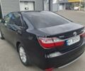 Черный Тойота Камри, объемом двигателя 2.49 л и пробегом 132 тыс. км за 19000 $, фото 1 на Automoto.ua