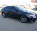 Черный Тойота Камри, объемом двигателя 2.49 л и пробегом 220 тыс. км за 14100 $, фото 1 на Automoto.ua