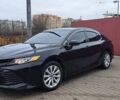 Черный Тойота Камри, объемом двигателя 2.49 л и пробегом 225 тыс. км за 18000 $, фото 1 на Automoto.ua