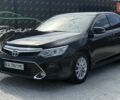 Черный Тойота Камри, объемом двигателя 2.49 л и пробегом 105 тыс. км за 18900 $, фото 1 на Automoto.ua