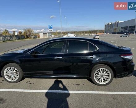 Черный Тойота Камри, объемом двигателя 2.5 л и пробегом 127 тыс. км за 22500 $, фото 1 на Automoto.ua