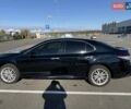Черный Тойота Камри, объемом двигателя 2.5 л и пробегом 127 тыс. км за 22500 $, фото 1 на Automoto.ua