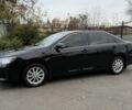 Черный Тойота Камри, объемом двигателя 2.5 л и пробегом 133 тыс. км за 18700 $, фото 1 на Automoto.ua