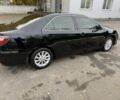 Черный Тойота Камри, объемом двигателя 2.5 л и пробегом 133 тыс. км за 18700 $, фото 4 на Automoto.ua