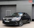 Черный Тойота Камри, объемом двигателя 2.49 л и пробегом 215 тыс. км за 12700 $, фото 1 на Automoto.ua