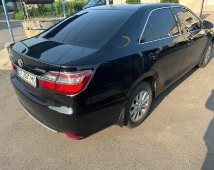 Черный Тойота Камри, объемом двигателя 2.5 л и пробегом 140 тыс. км за 17200 $, фото 2 на Automoto.ua