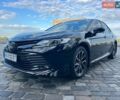 Черный Тойота Камри, объемом двигателя 2.49 л и пробегом 76 тыс. км за 21300 $, фото 1 на Automoto.ua