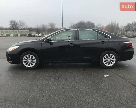 Черный Тойота Камри, объемом двигателя 2.5 л и пробегом 130 тыс. км за 15200 $, фото 4 на Automoto.ua