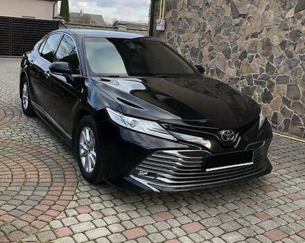 Черный Тойота Камри, объемом двигателя 2.49 л и пробегом 178 тыс. км за 19000 $, фото 1 на Automoto.ua