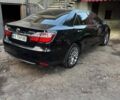Черный Тойота Камри, объемом двигателя 2.5 л и пробегом 176 тыс. км за 16500 $, фото 1 на Automoto.ua