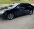 Чорний Тойота Камрі, об'ємом двигуна 2.49 л та пробігом 135 тис. км за 16400 $, фото 1 на Automoto.ua