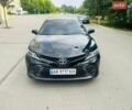 Черный Тойота Камри, объемом двигателя 2.49 л и пробегом 200 тыс. км за 20000 $, фото 1 на Automoto.ua