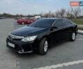 Черный Тойота Камри, объемом двигателя 2.49 л и пробегом 227 тыс. км за 15400 $, фото 1 на Automoto.ua
