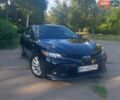 Черный Тойота Камри, объемом двигателя 2.4 л и пробегом 105 тыс. км за 19700 $, фото 1 на Automoto.ua