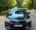 Черный Тойота Камри, объемом двигателя 2.5 л и пробегом 160 тыс. км за 18500 $, фото 1 на Automoto.ua