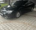 Черный Тойота Камри, объемом двигателя 2.5 л и пробегом 143 тыс. км за 17300 $, фото 1 на Automoto.ua