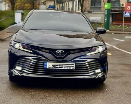 Черный Тойота Камри, объемом двигателя 2.5 л и пробегом 77 тыс. км за 25600 $, фото 1 на Automoto.ua