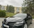 Черный Тойота Камри, объемом двигателя 2.49 л и пробегом 180 тыс. км за 20800 $, фото 1 на Automoto.ua